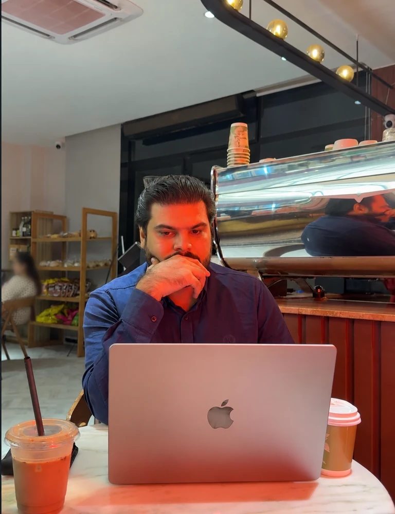 Jang Sher Ali working on digital marketing strategy